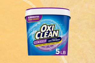 OxiCleanOdorBlasters stain & Odor清除器显示在双调波纹背景